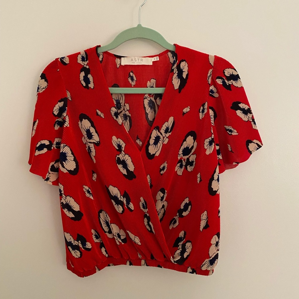 Red floral top.